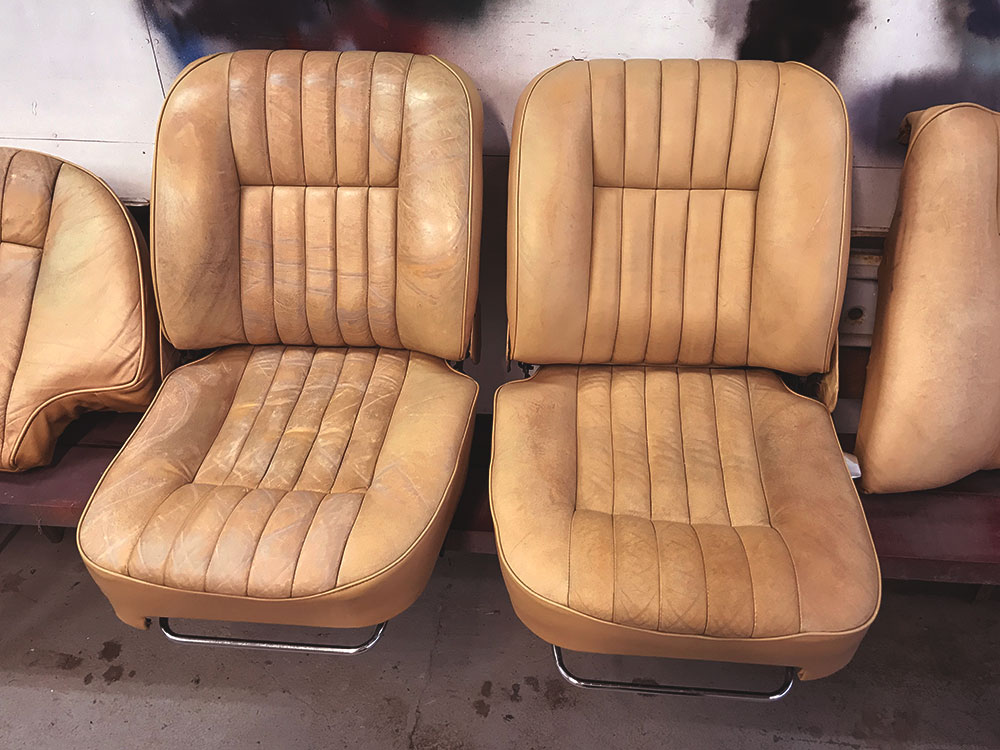 Worn and faded Jaguar seats