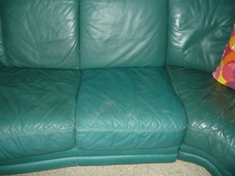 scruffy green leather couch