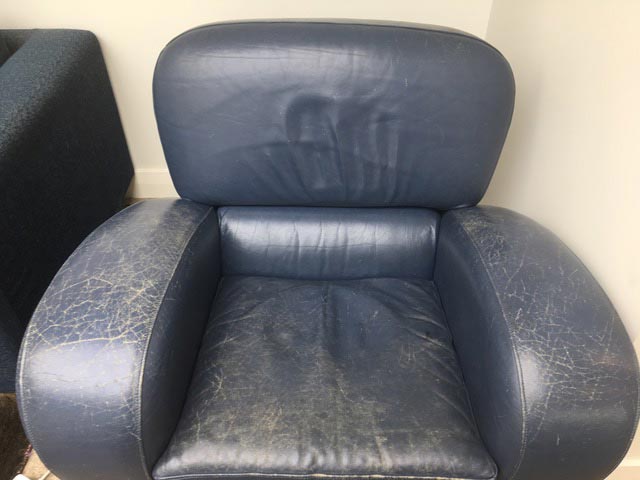 blue leather chair before
