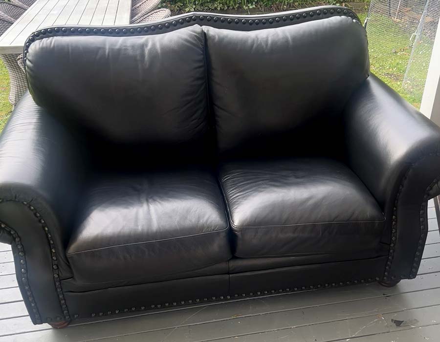 Green leather couch refinished to black