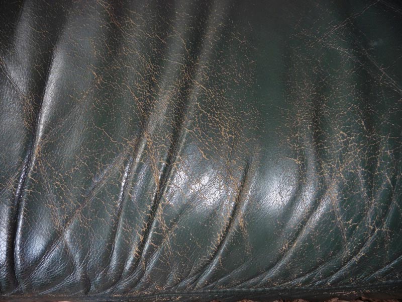 Green leather sofa before
