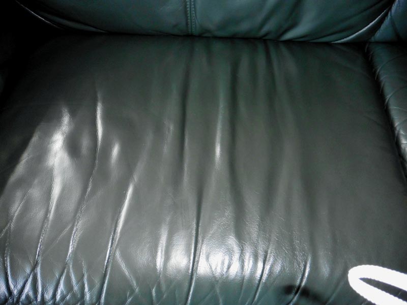 Green leather sofa after