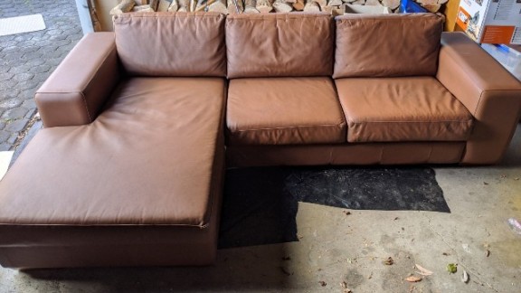 Faded leather couch