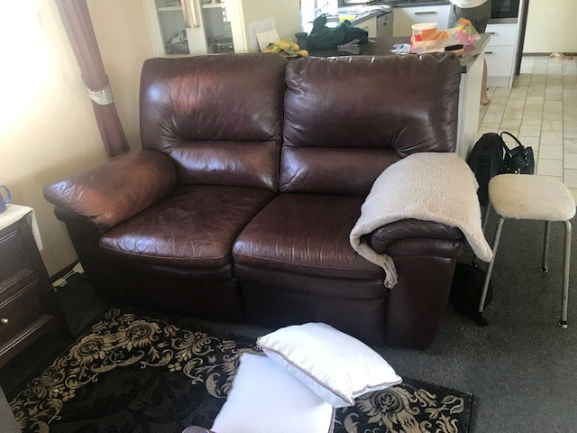 Leather couch before restoration