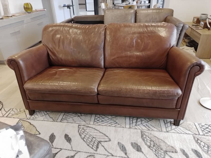 Faded waxed oiled couch