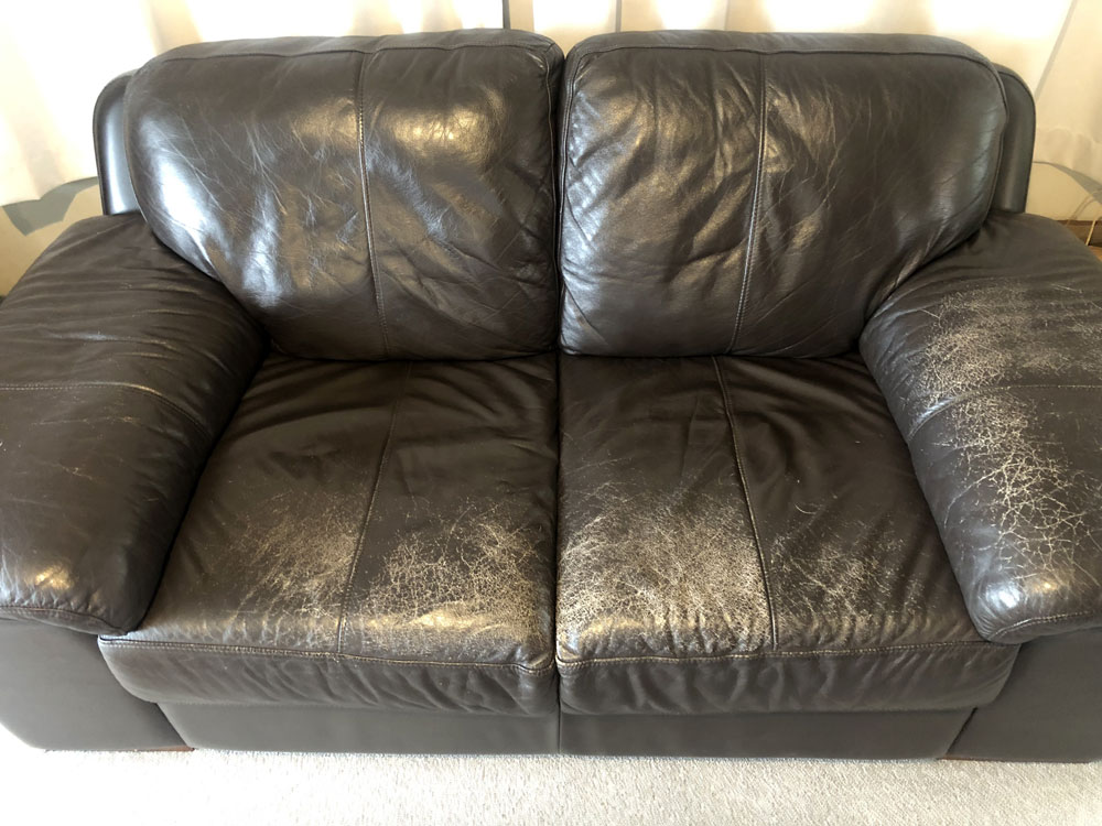 Cracked leather seat and arms