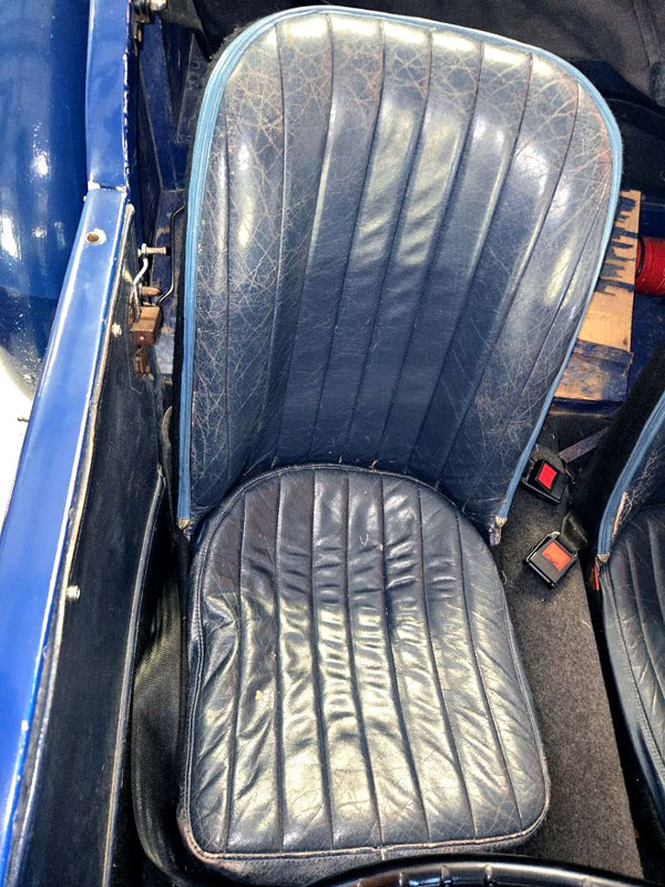 worn out leather drivers seat