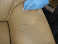 rubbing the colour into the leather pores rubbing the colour into the leather pores